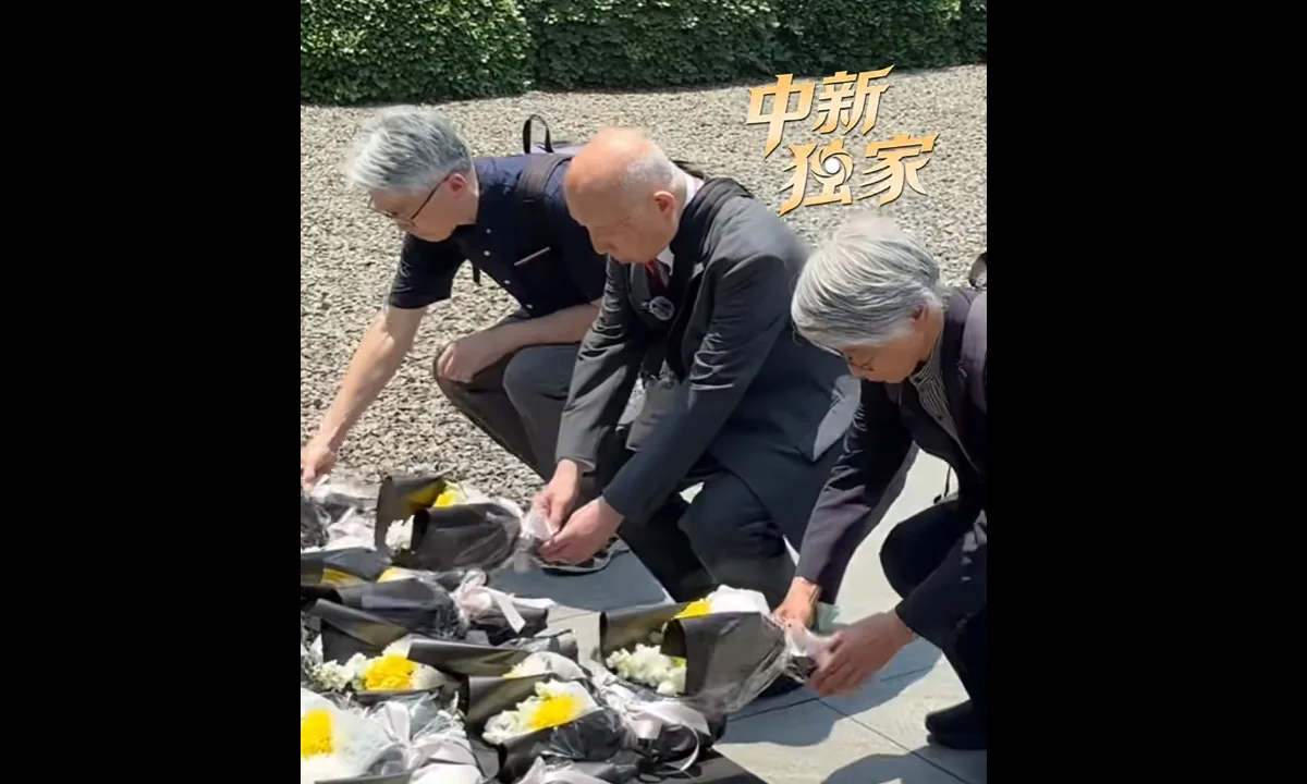 Japanese scholars honor Nanjing Massacre victims, demand wartime accountability.